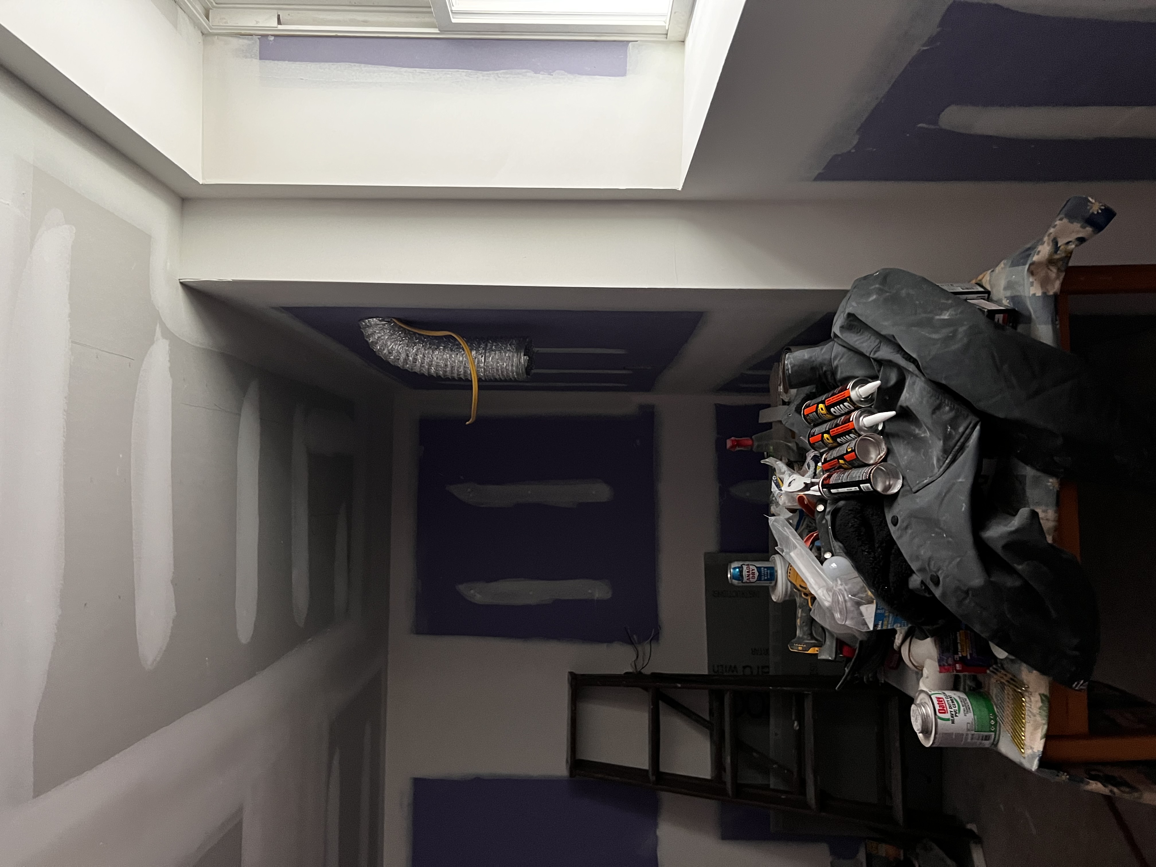 Professional drywall installation in progress